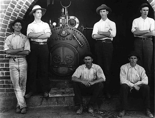 Dairy Factory (interior): Students sitting in front of boiler (Print 1 of 2) [Hawkesbury Agricultural College (HAC)] c.1910 (P2108)