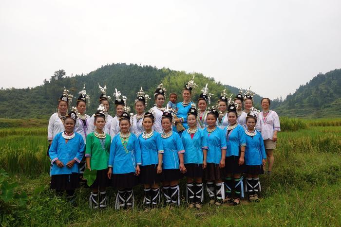 Catherine Ingram with Kam Women in Guizhou. Credit Xie Zi-chong