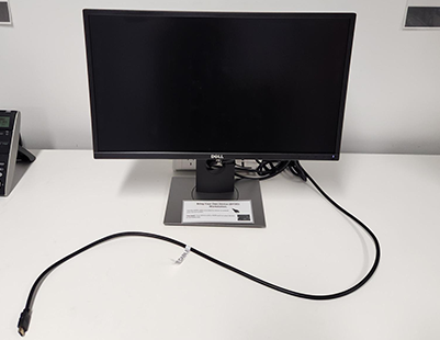 Bring Your Own Device (BYOD) workstation. Single monitor and labelled HDMI cable.