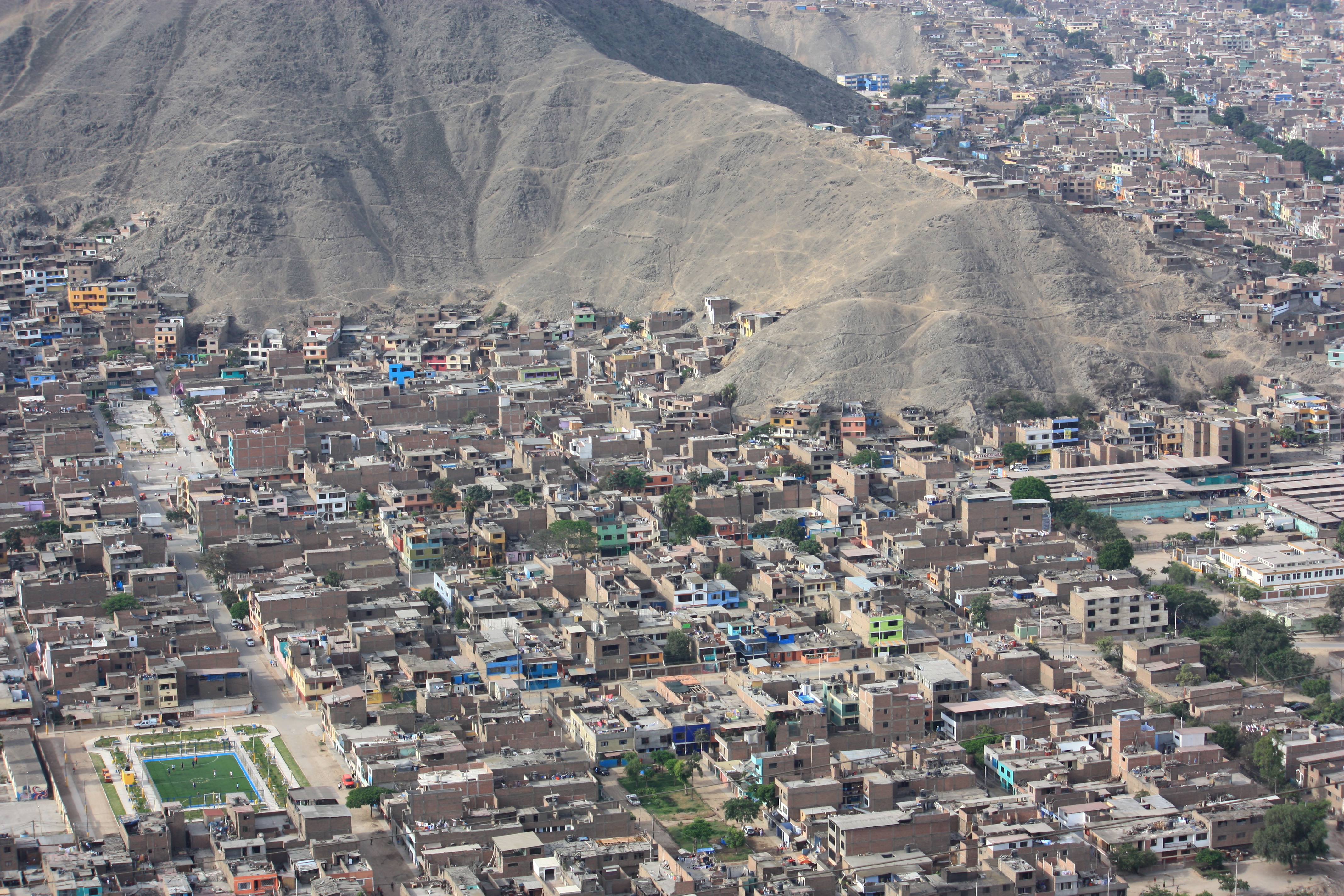 Arial shot of the city of Lima, houses and urbanisation