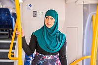Muslim woman in head scarf - small