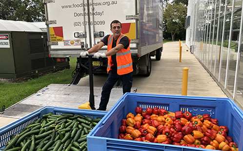 Produce such as capsicums and cucumbers being collected for Foodbank NSW and ACT