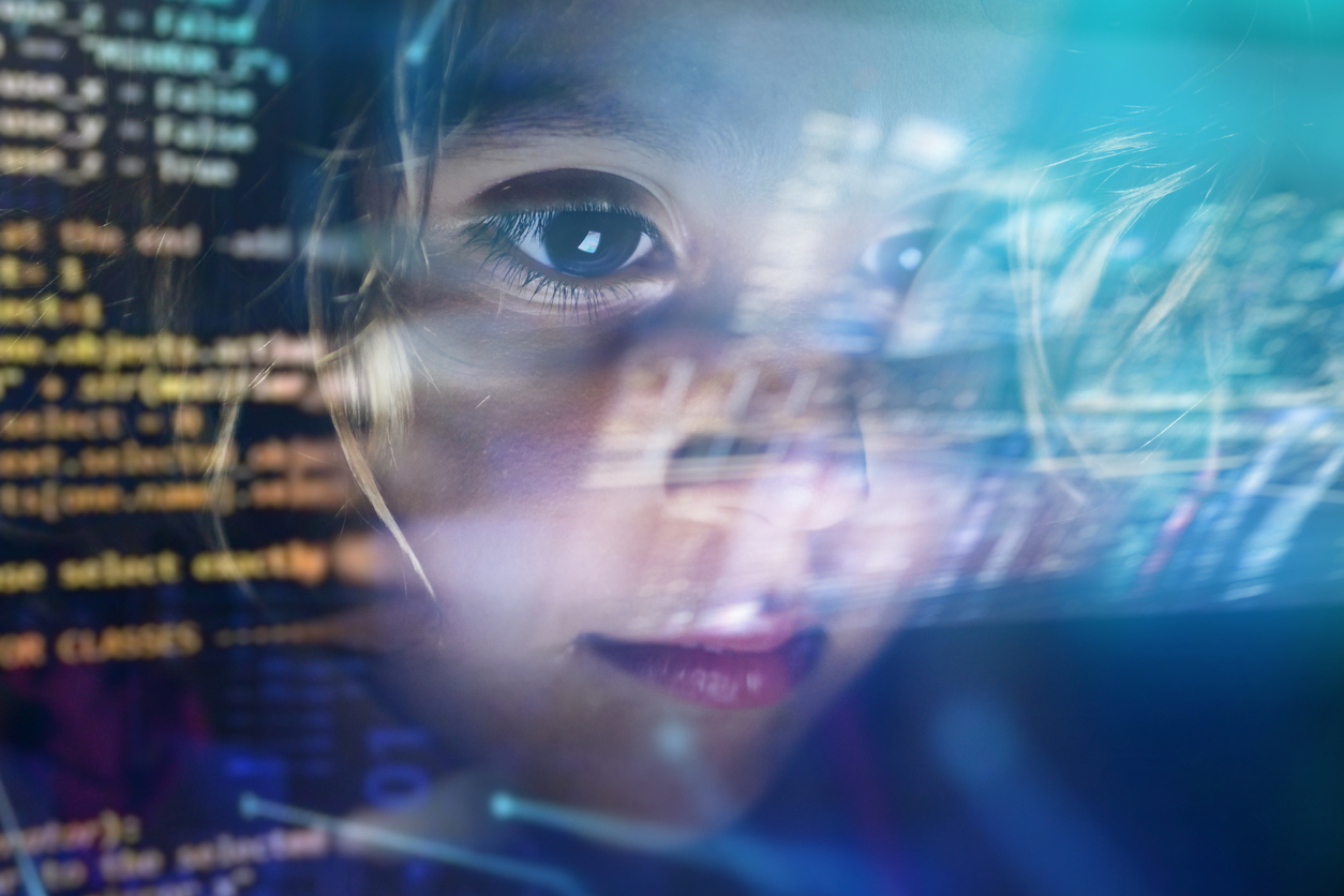 Image of a child looking at data on a screen Image of a child looking at data on a screen