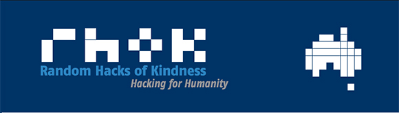 A blue background with the letters RHoK and an icon of Australia written out in white squares. In blue and grey writing it reads Random Hacks of Kindness: Hacking for Humanity.