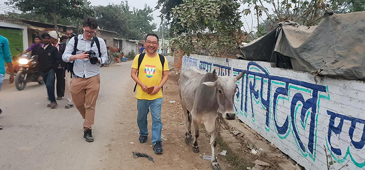 WSU staff and student walking in street