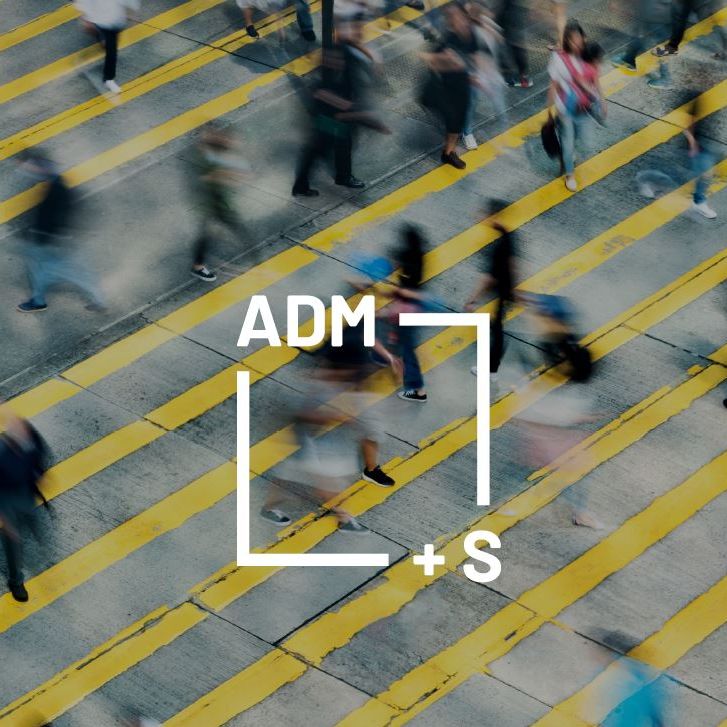 Approximately two dozen pedestrians walk in all directions across concrete which has yellow stripes painted diagonally across it. The figures are blurred and indistinct, indicating movement. The logo for the Centre for Excellence for Automated-Decision Making and Society is super-imposed on this image. The logo is a white box with the characters ADM+S on its perimeter. Approximately two dozen pedestrians walk in all directions across concrete which has yellow stripes painted diagonally across it. The figures are blurred and indistinct, indicating movement. The logo for the Centre for Excellence for Automated-Decision Making and Society is super-imposed on this image. The logo is a white box with the characters ADM+S on its perimeter.