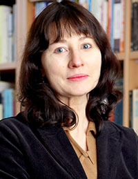 portrait photograph of a woman with shoulder-length hair