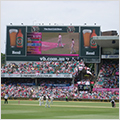 Thumbnail of cricket game at Sydney Cricket Ground showing players, the crowd and the scoreboard.