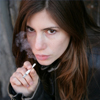 a young woman smoking cannabis