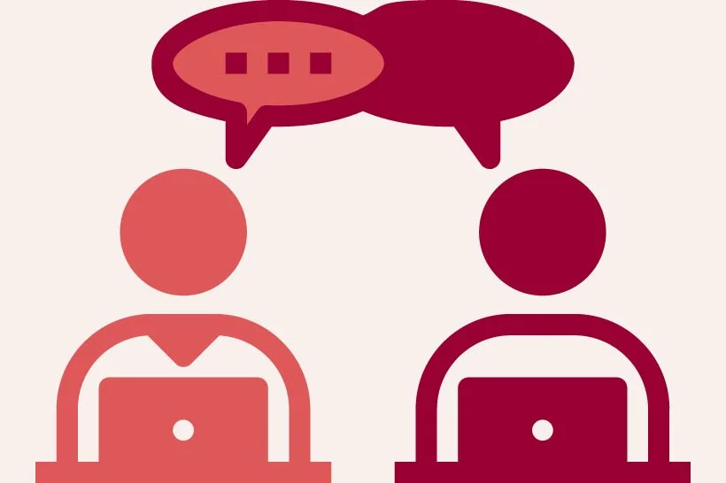 Two people with laptops with talking speech bubbles icon