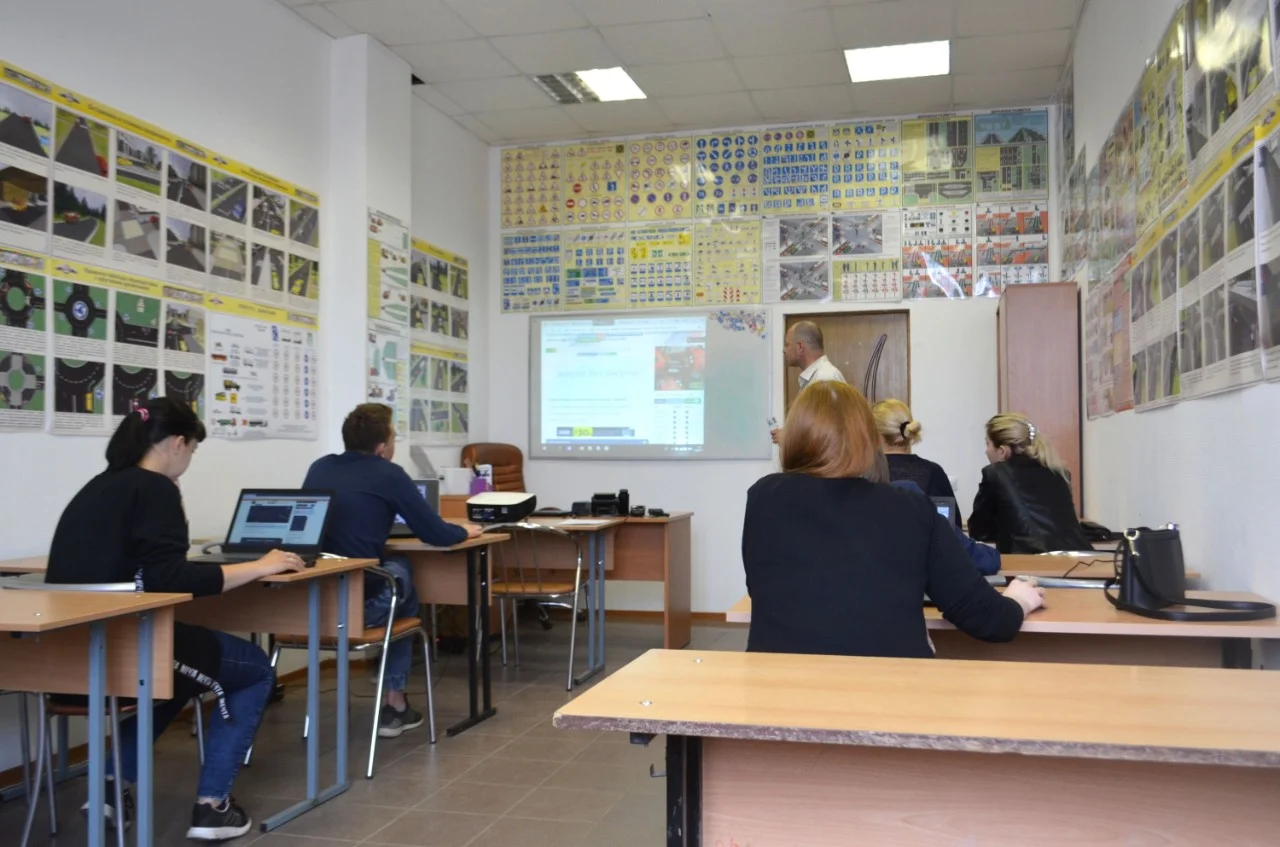 Students on laptops in classroom