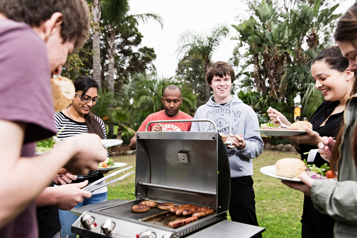 Male student using phone,Male student using phone
