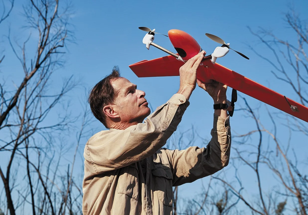 Matthias Boer setting up a drone to take observations in Bilpin, NSW.