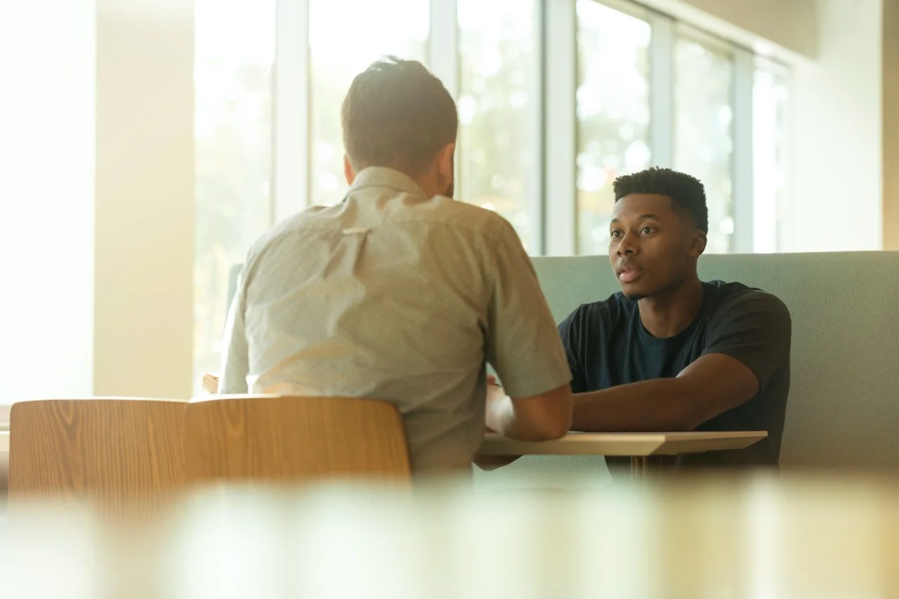 Men engaging in conversation