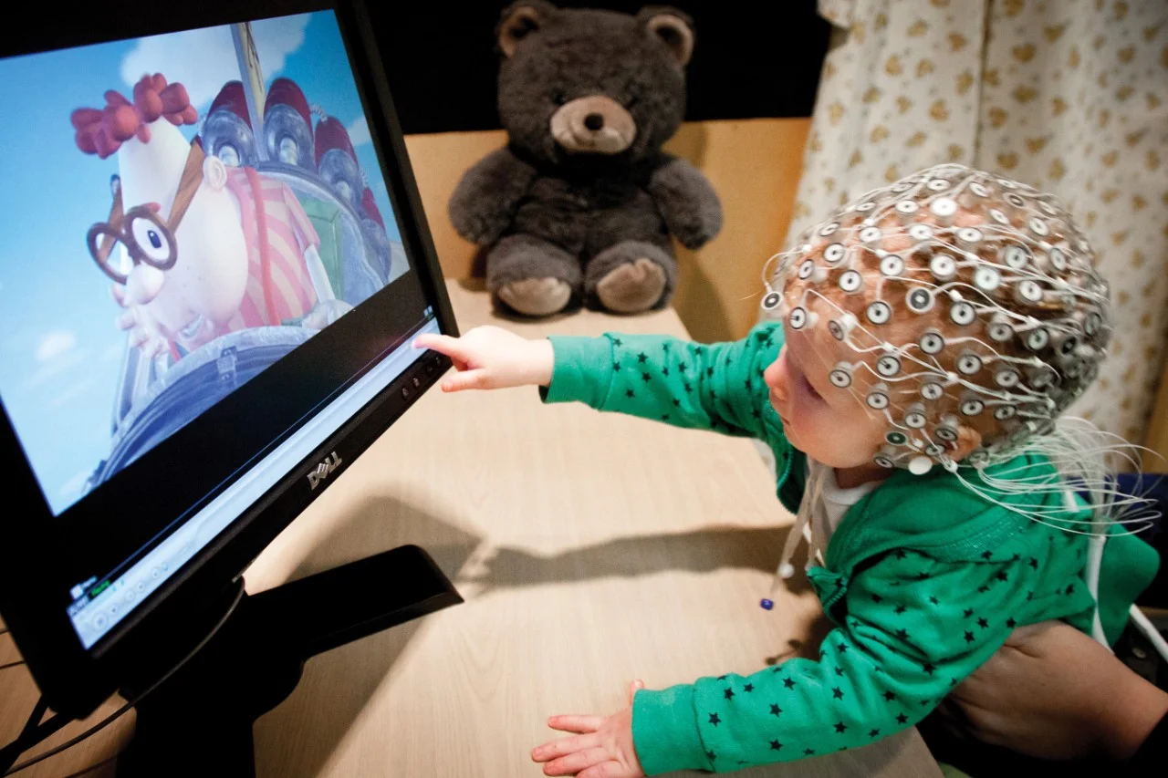 Babylab with a baby participating in research,Babylab with a baby participating in research