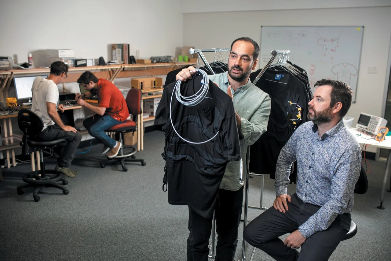 Gaetano Gargiulo (left) and Paul Breen examine VitalCore technology.