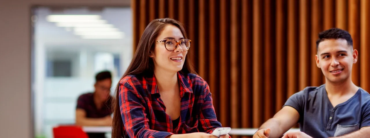 students talking on campus