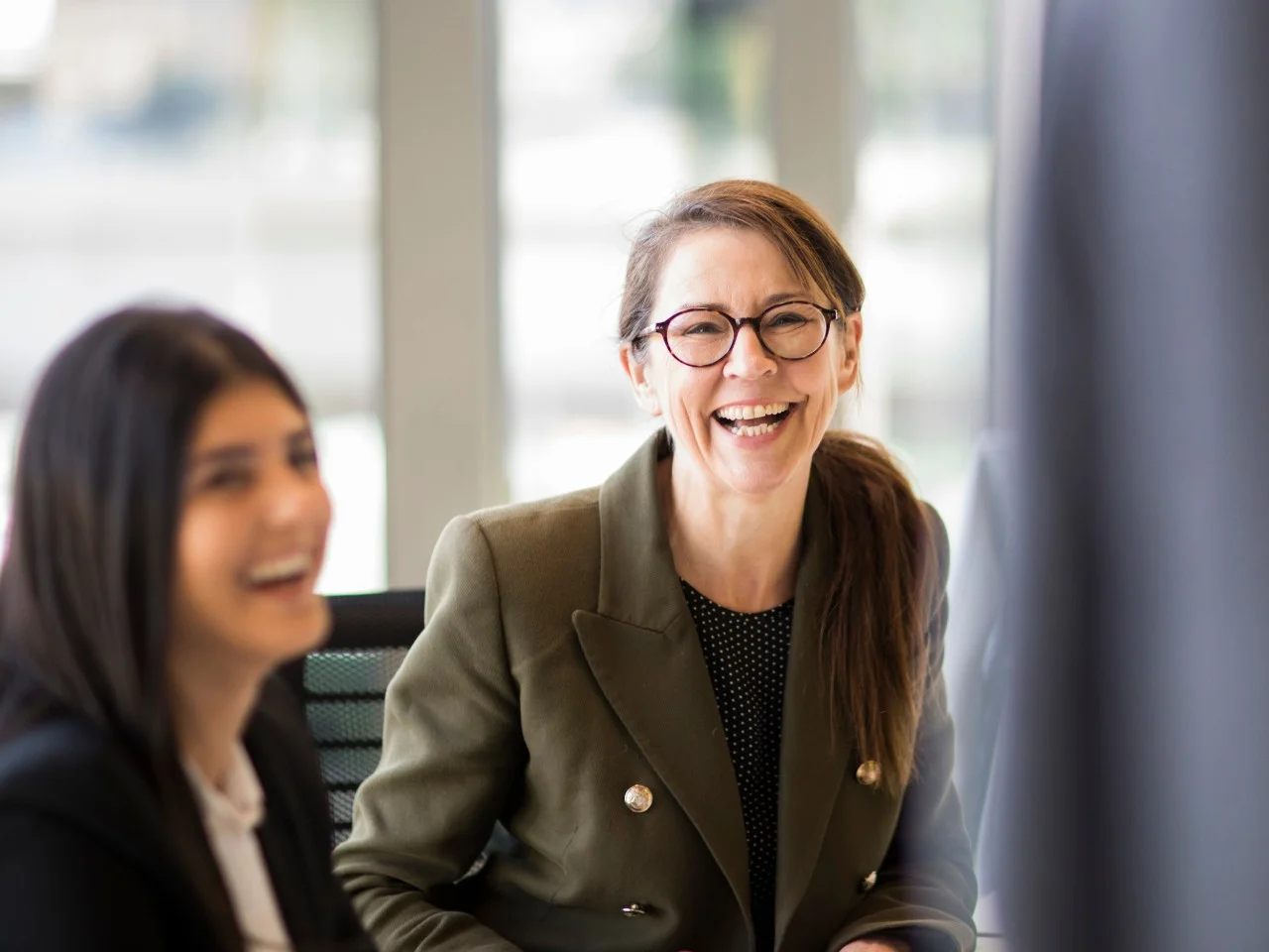 Two women smiling