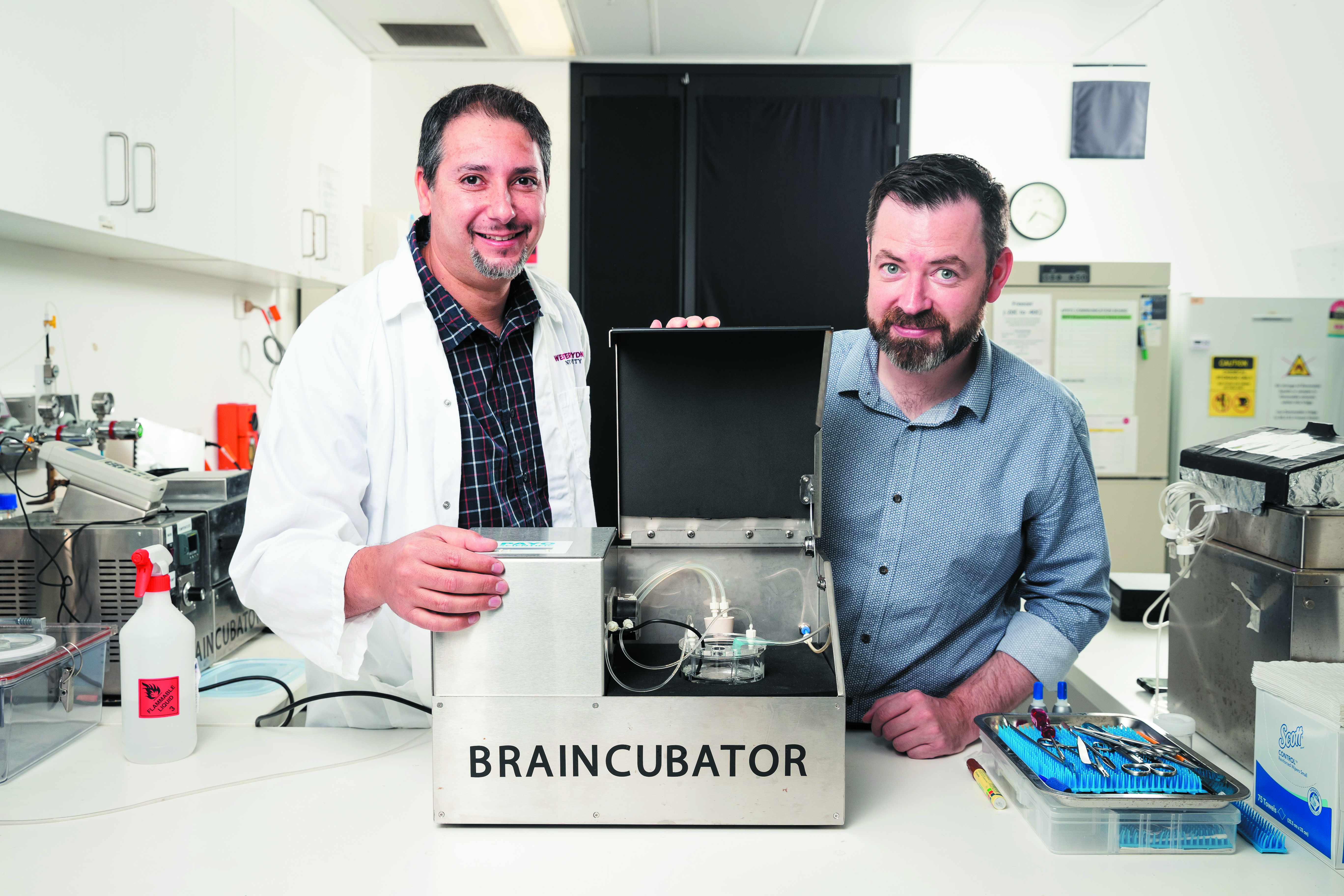 Dr Yossi Buskila (left) and A/Prof. Paul Breen (right) with the Braincubator.