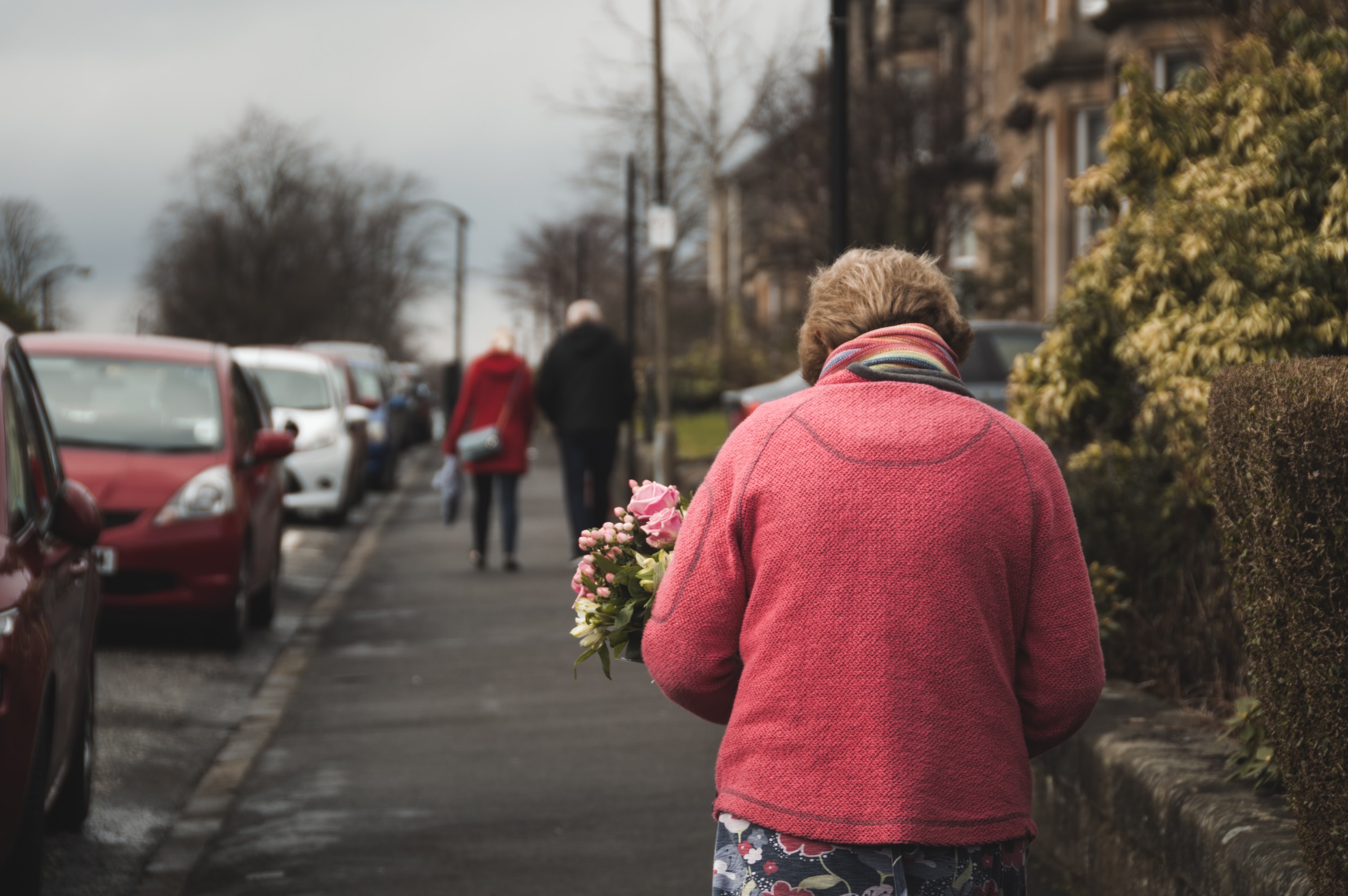 Older woman walking down the street