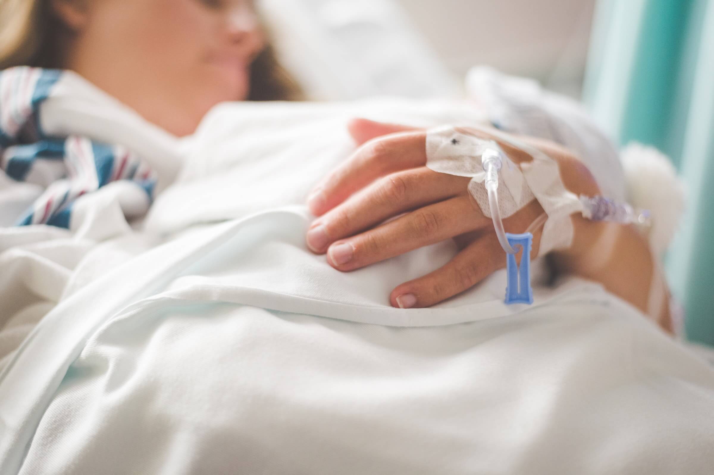 Woman in a hospital bed