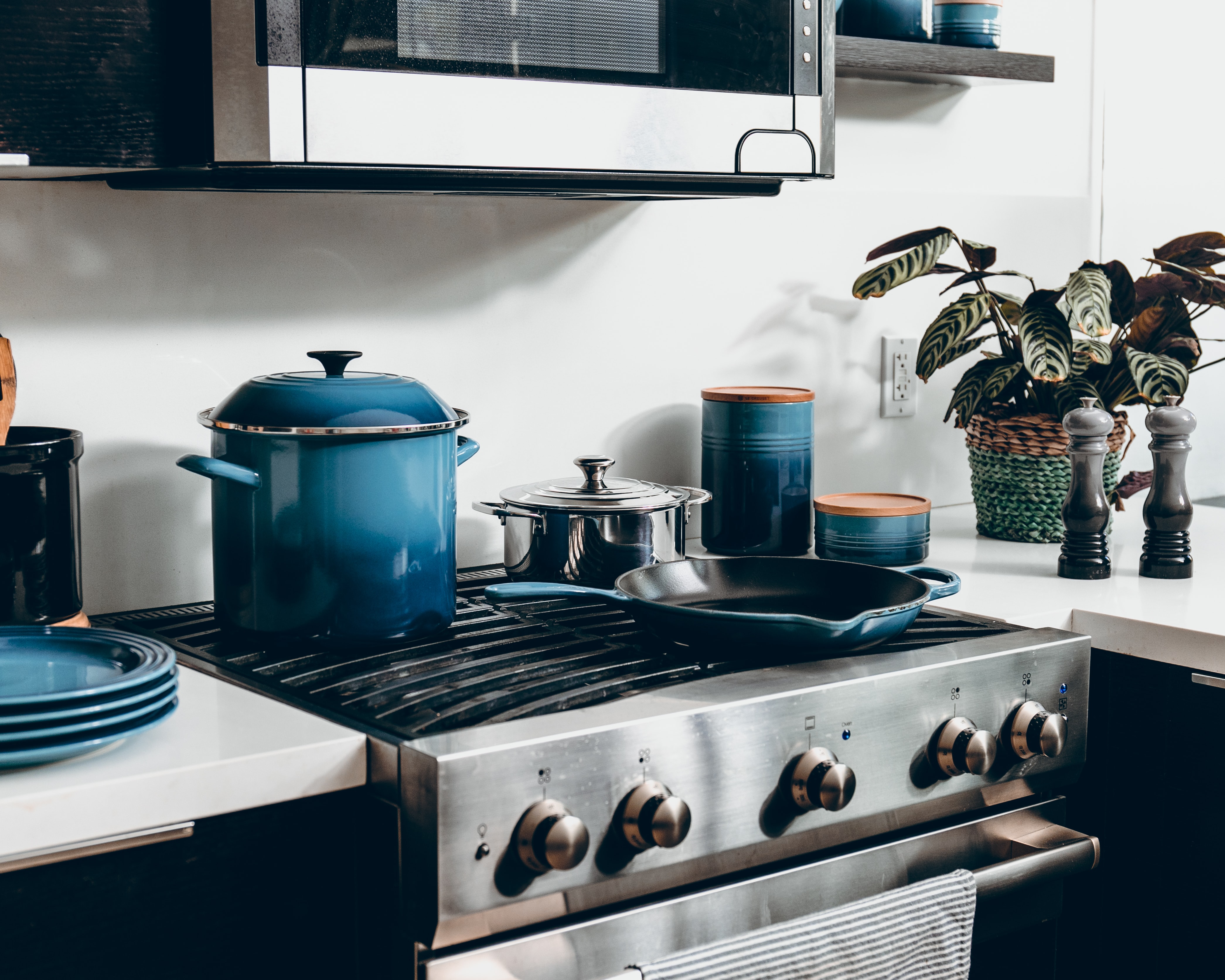 Pots and saucepans on a gas stove top