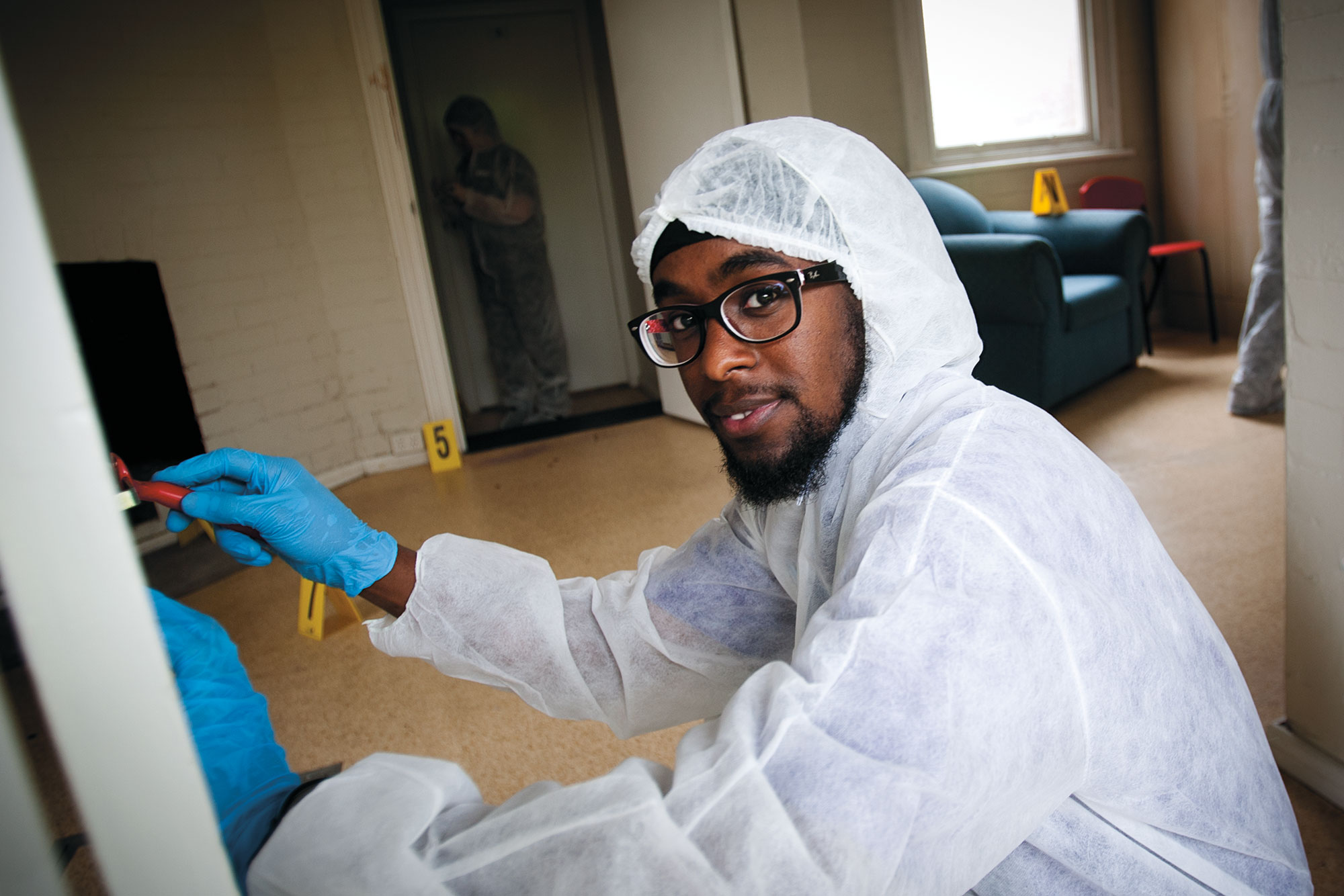 Students get hands on experience in Western's crime scene house