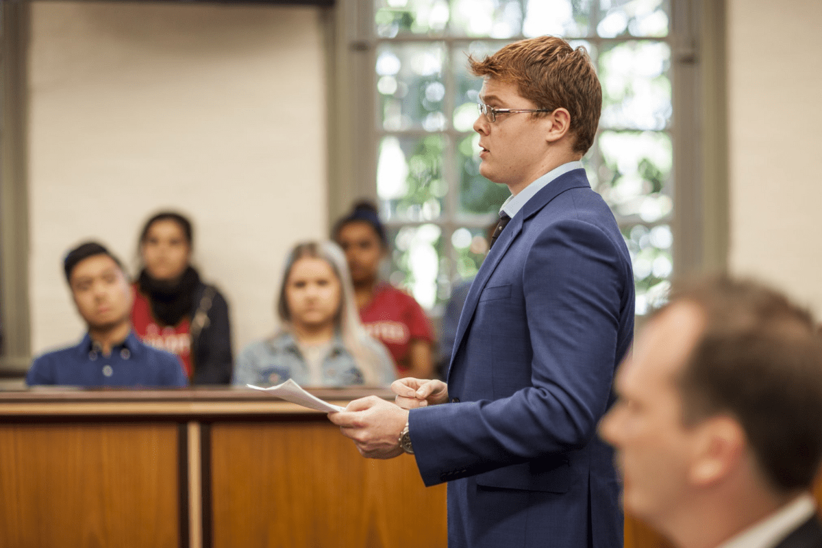 A male law student in the Moot Court