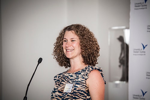 Dr Philippa Collin speaking at the Women's Day celebration.