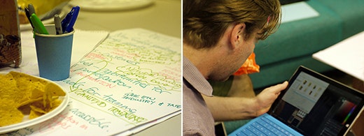 Photo of paper with writing on it and a man looking at his laptop.