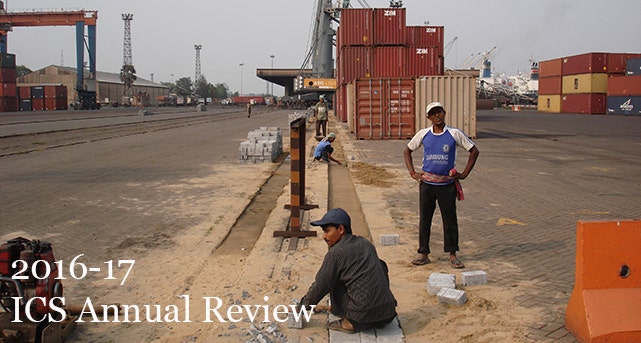 Four Indian men doing repair work on the rails