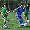 A thumbnail image of children playing soccer