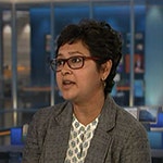 Malini Sur speaking to camera