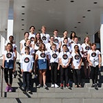 A group of young people on the steps of the Museum of Australian Democracy