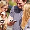 Young people on their mobiles