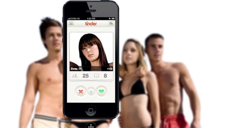 Two young men and a woman with an iphone and tinder app