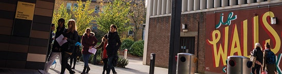 Students walking between buildings at Goldsmiths