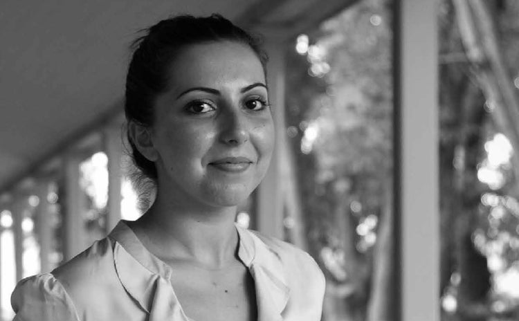 Black and white head-shot image of Sherene