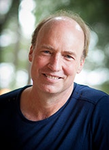 Portrait photo of Adjunct Professor Paul James