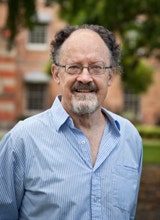 Professor Bob Hodge with trees and the Female Orphan School in the background.