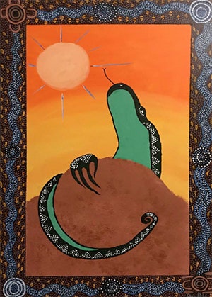 A painting of a green reptile leaning on a rock with a sun and orange sky behind it. This image is surrounded by a patterned border.