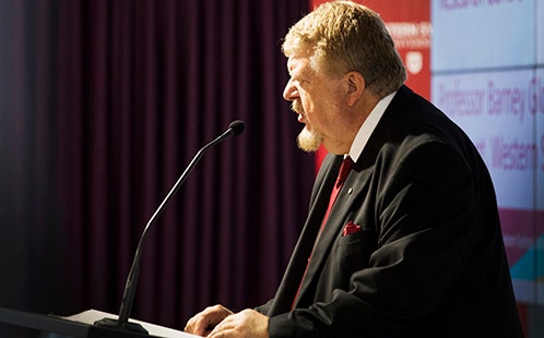 Sev Ozdowski speaking at lectern