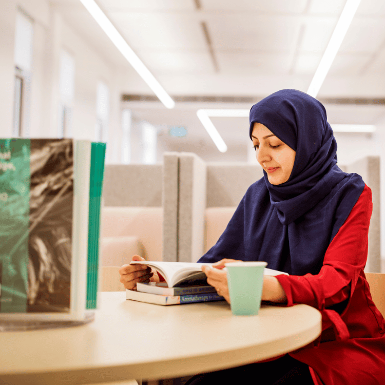 Zahra Ayati reading a book