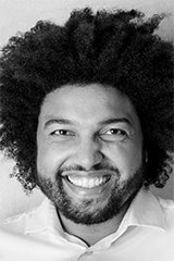 Headshot of Tuki Attuquayefio.