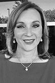 Headshot of Nadia Badawi.