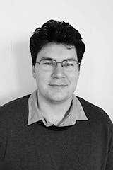 Headshot of Sam Hogan.