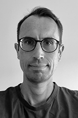 Headshot of Andrew Grainger.