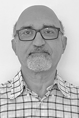 Headshot of Kazem Razaghi.