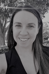 Headshot of Rhiannon White.