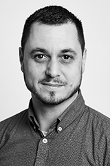 Headshot of Andrew Kellett.